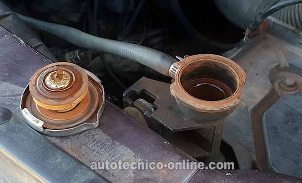 Agua Sale Disparada Del Radiador Abierto. Cómo Probar El Empaque De La Cabeza (1991, 1992, 1993, 1994, 1995 2.5L Dodge Caravan y Plymouth Voyager) Agua Sale Disparada Del Radiador Abierto. Cómo Probar El Empaque De La Cabeza (1991, 1992, 1993, 1994, 1995 2.5L Dodge Caravan y Plymouth Voyager)